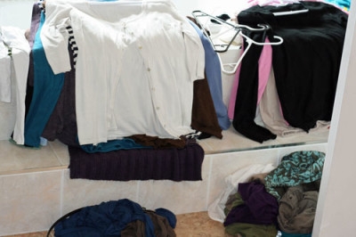 clothes-in-piles-to-try-on